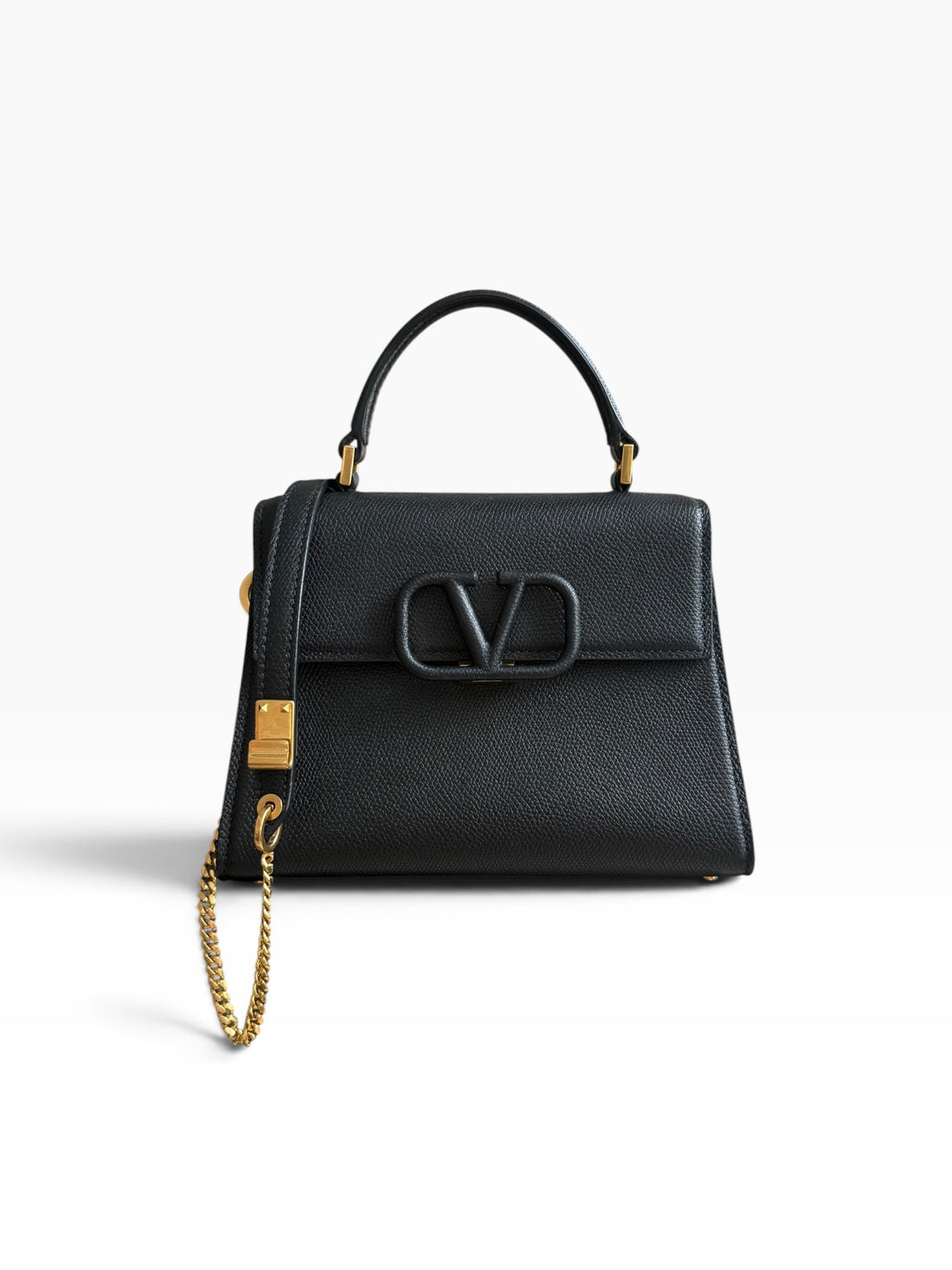 Petit sac à main Valentino Garavani Vsling en cuir de veau grainé noir.