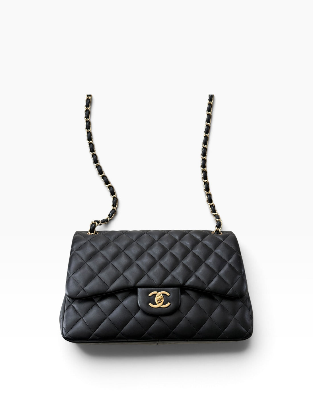 Chanel Classic Timeless Jumbo Double Flap Bag aus schwarzem Lammleder mit goldfarbener Hardware.