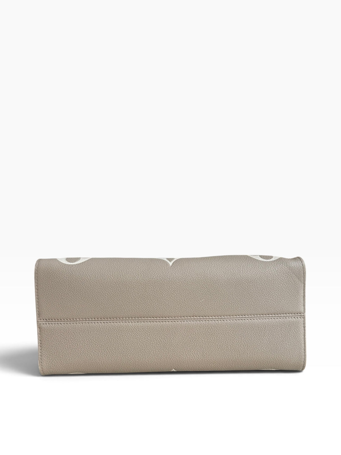 Louis Vuitton On-The-Go MM in Empreinte Leder in der Farbe Tourterelle / Beige Beige.