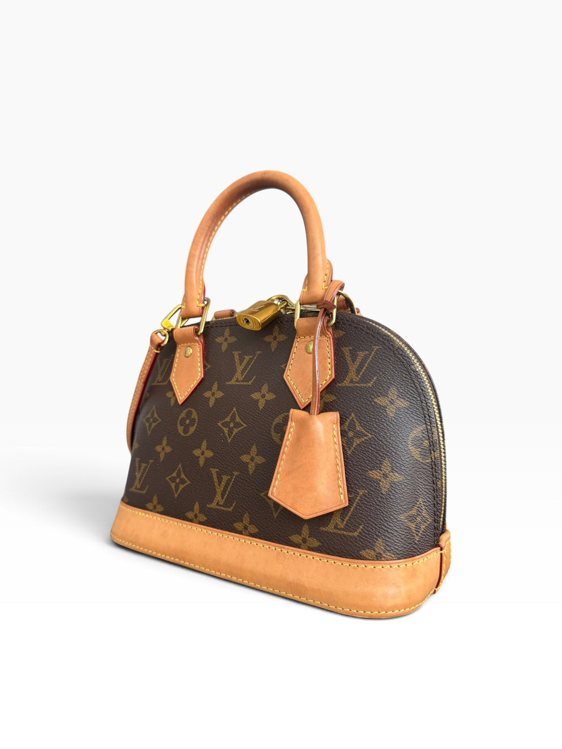 Louis Vuitton Alma BB in tela Monogram con tracolla rimovibile. Tela Monogram rivestita