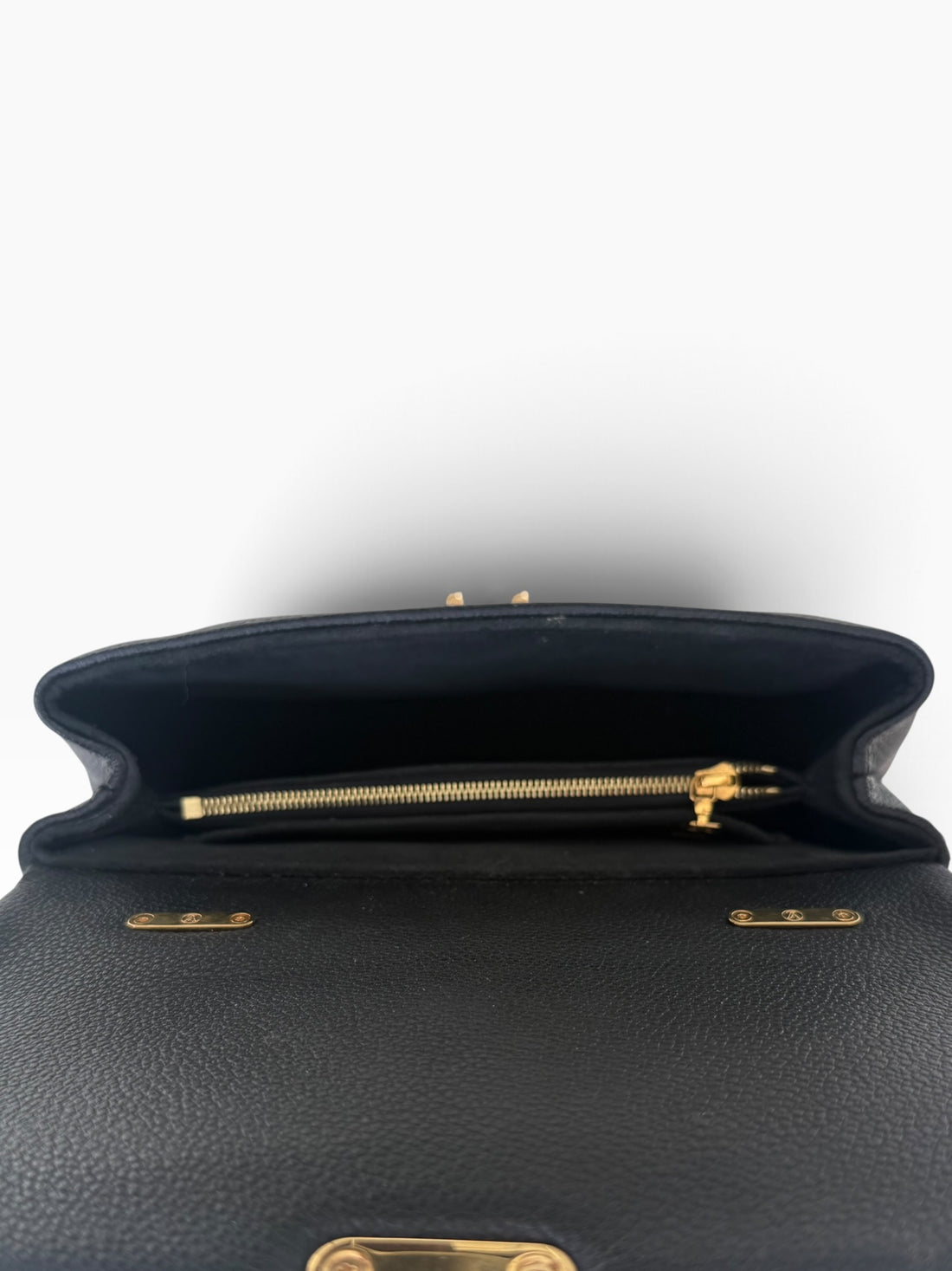 Louis Vuitton Madeleine BB aus schwarzem genarbtem Monogram Empreinte Rindsleder.