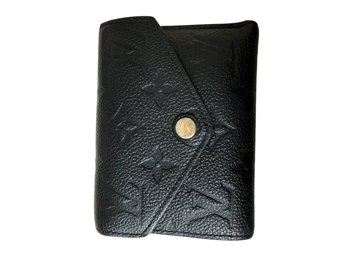 Louis Vuitton Victorine Geldbörse aus schwarzem Leder.