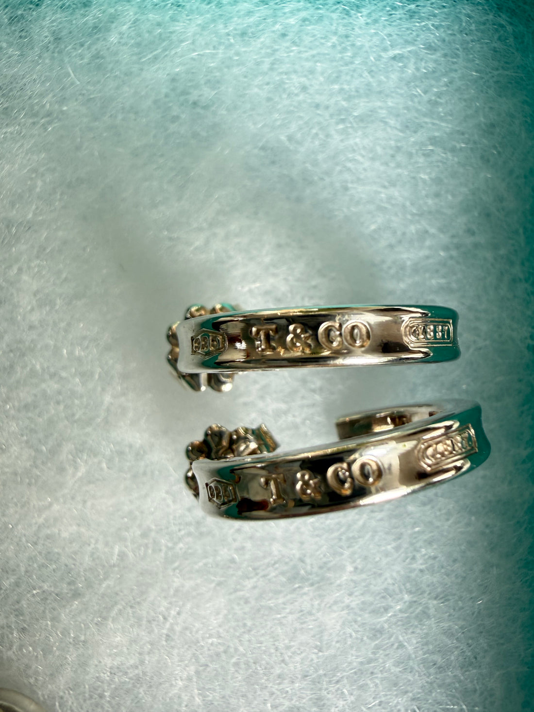 Tiffany 1837™ Interlocking Circle Set aus Kreolen und Armkette