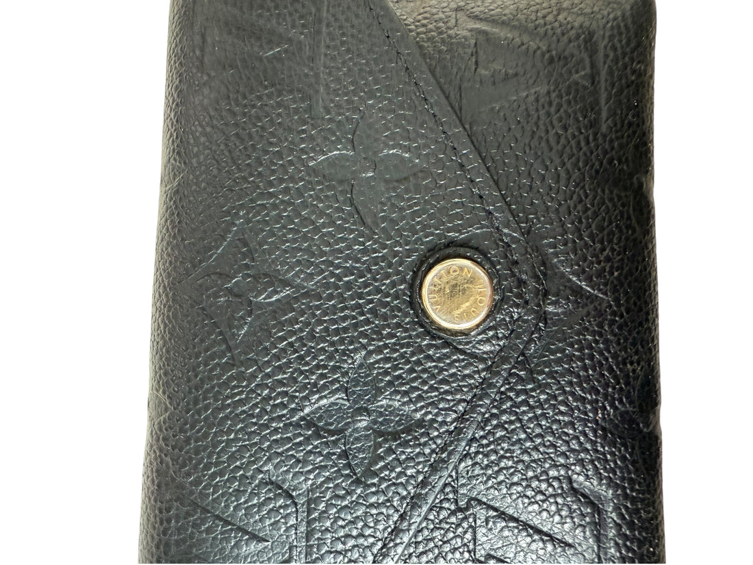 Louis Vuitton Victorine Geldbörse aus schwarzem Leder.