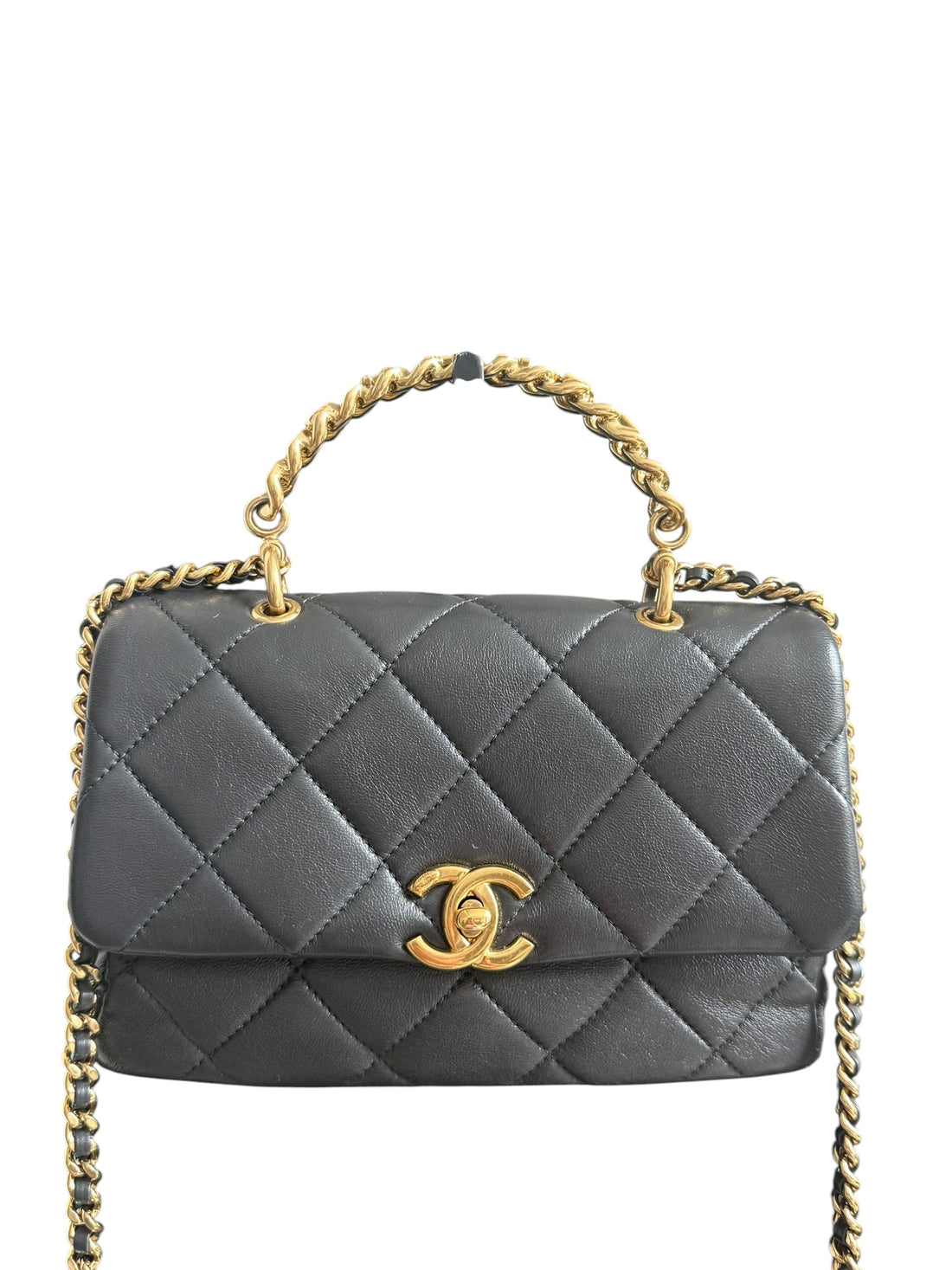 Chanel Timeless Classic Handle aus weichem Lammleder in der Farbe dunkelgrau und goldfarbener Hardware.