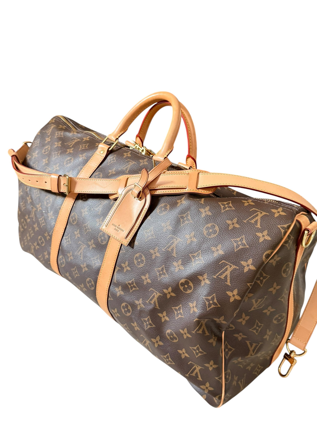 Louis Vuitton Keepall 55 Monogram Canvas mit abnehm- und verstellbarem Schulterriemen.