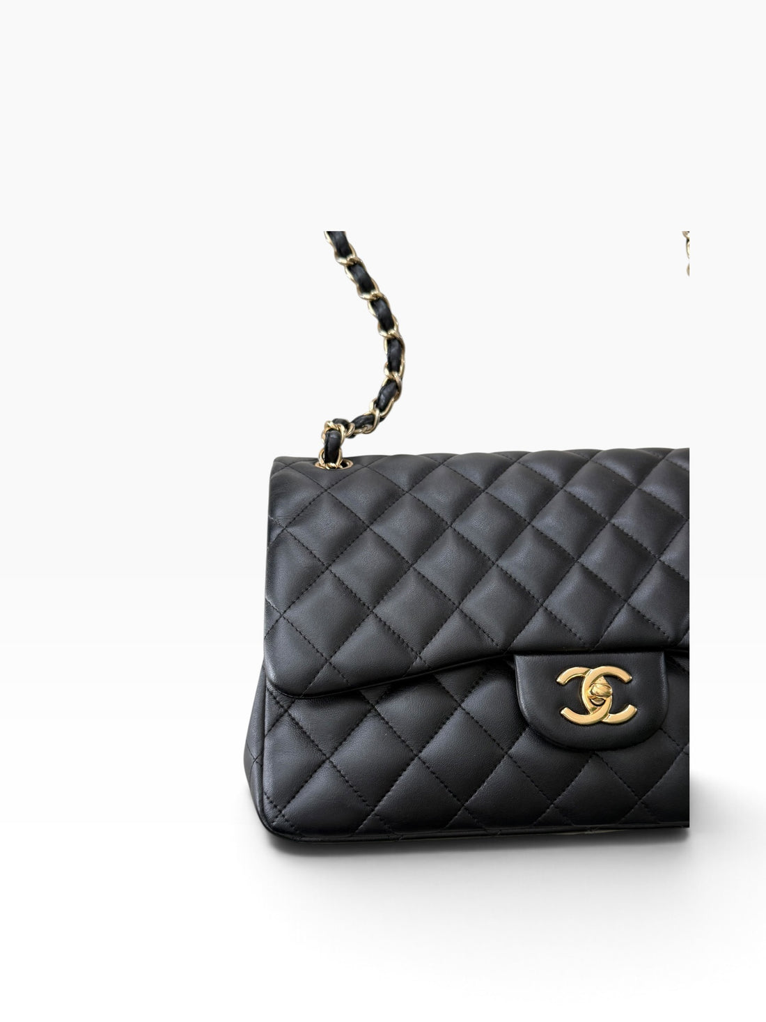 Chanel Classic Timeless Jumbo Double Flap Bag aus schwarzem Lammleder mit goldfarbener Hardware.