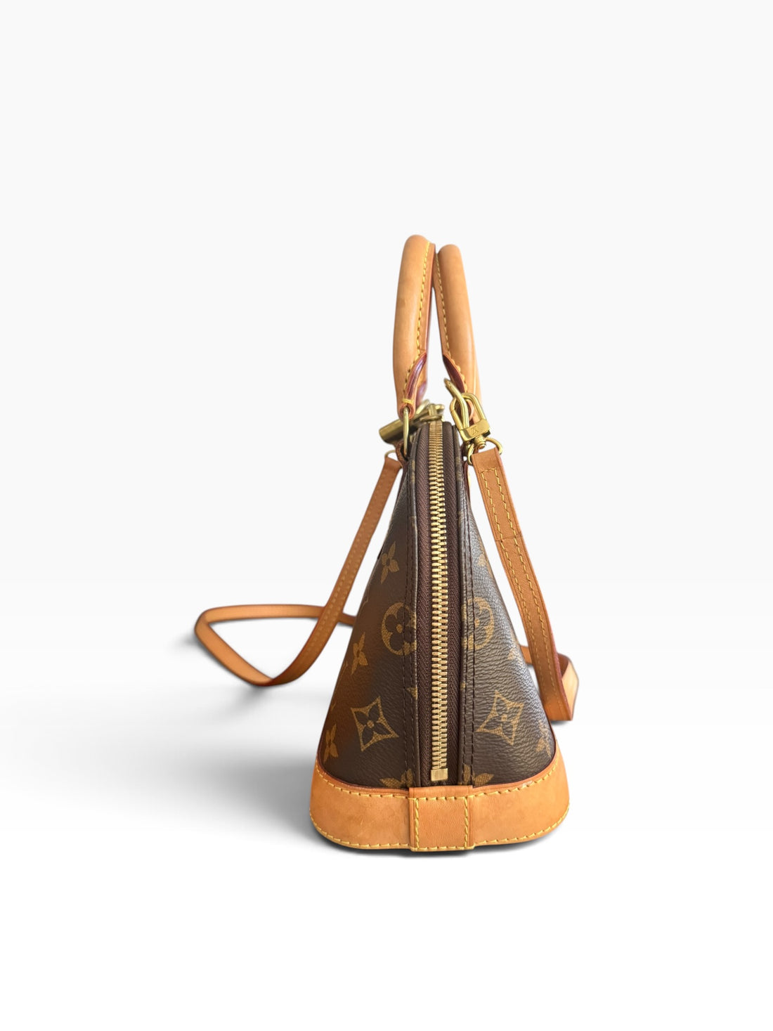 Louis Vuitton Alma BB Monogram Canvas mit abnehmbarem Schulterriemen.