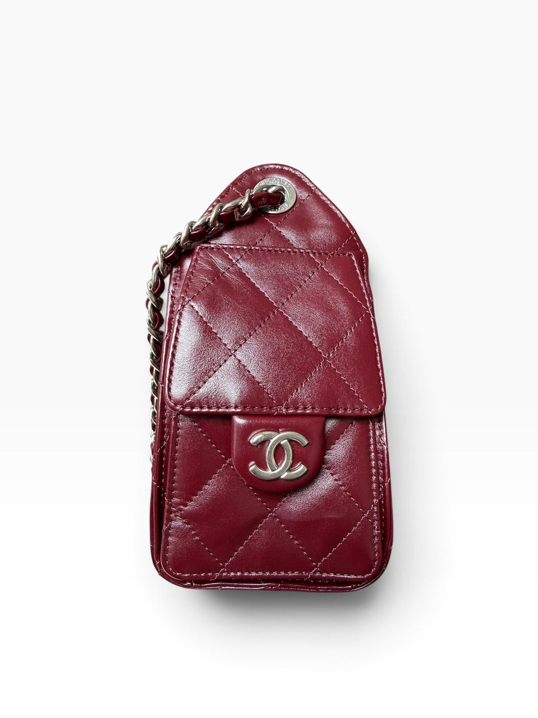 Chanel 25 mini in Burgunder aus glänzendem und geknautschtem Kalbsleder und silberfarbener Hardware.