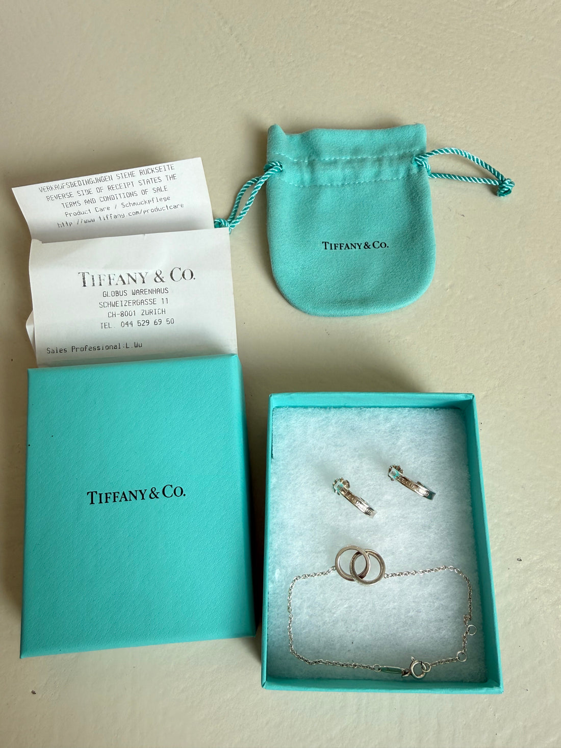 Tiffany 1837™ Interlocking Circle Set aus Kreolen und Armkette