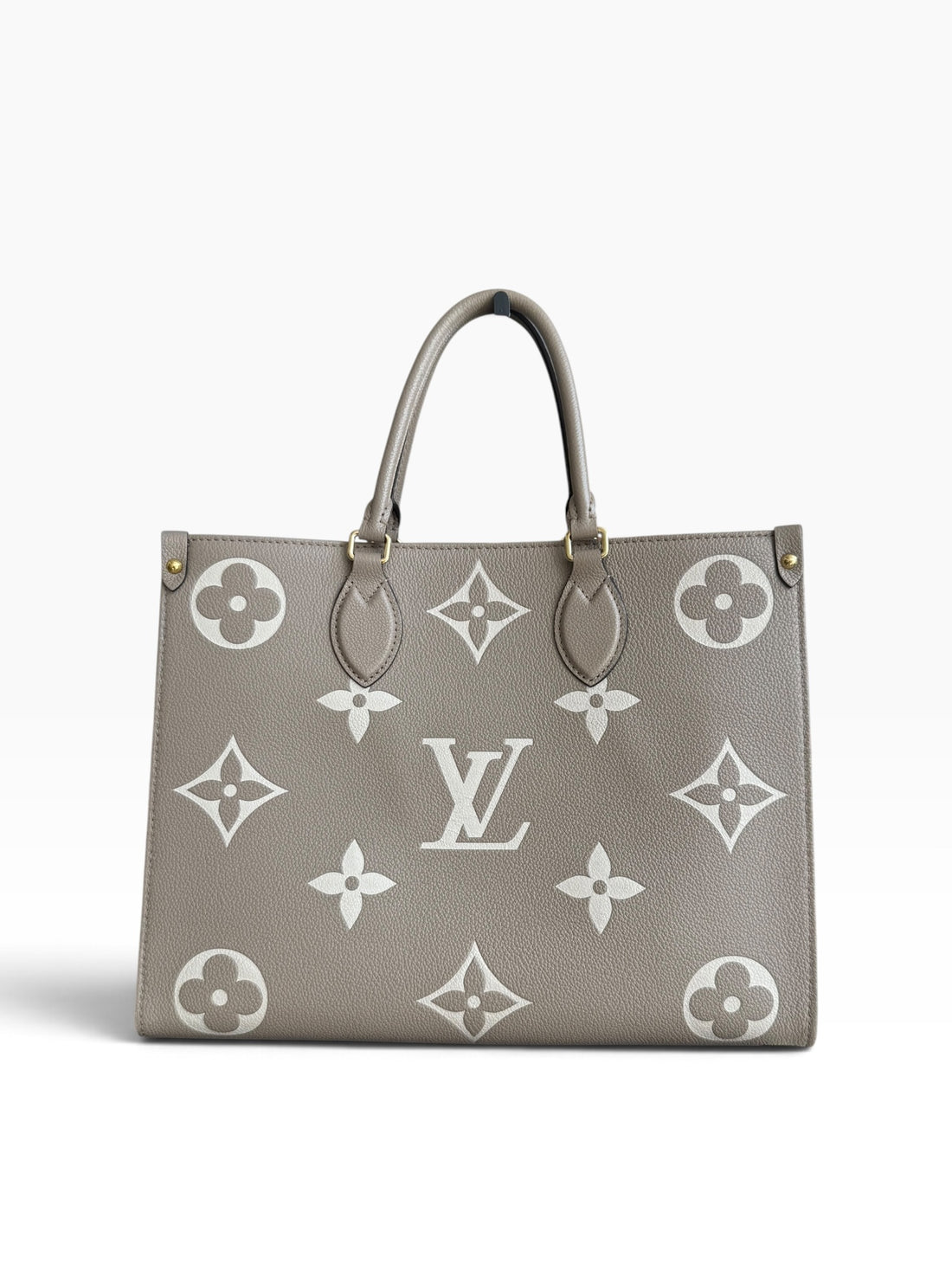Louis Vuitton On-The-Go MM in Empreinte Leder in der Farbe Tourterelle / Beige Beige.